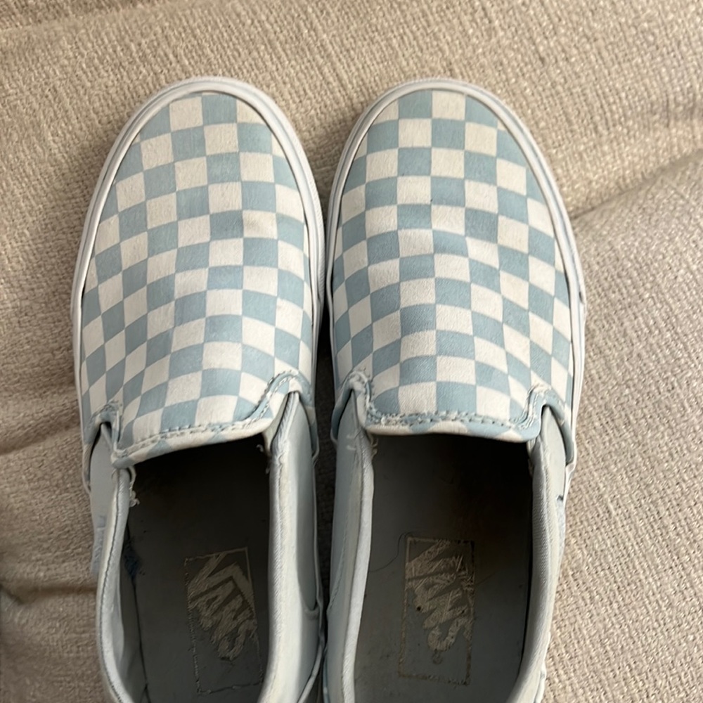 Baby blue and white checked vans.
